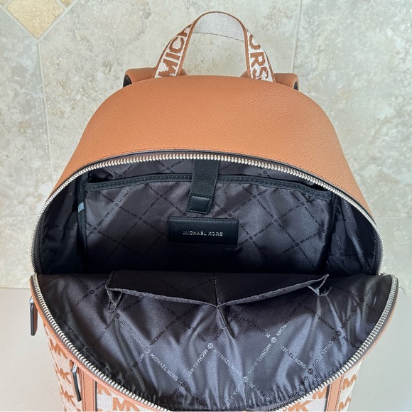 cooper faux leather commuter backpack Combining a sporty aesthetic with luxurious details Michael Kors Outlet Cooper Pebbled